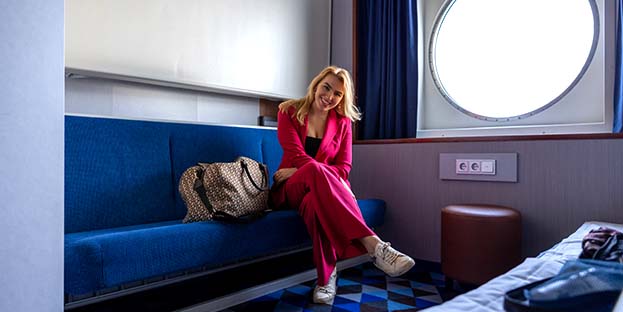 A woman in Cabin onboard m/s Finlandia